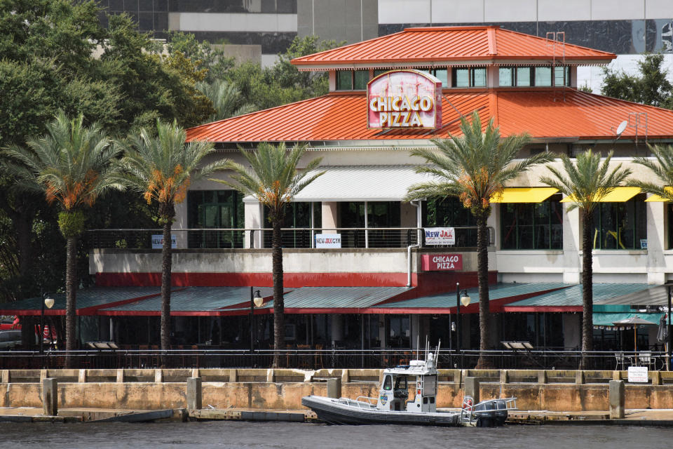 <p>Law enforcement boats patrol the St. Johns River at The Jacksonville Landing after a mass shooting during a video game tournament at the riverfront mall, Aug. 26, 2018, in Jacksonville, Fla. (Photo: Will Dickey/The Florida Times-Union via AP) </p>