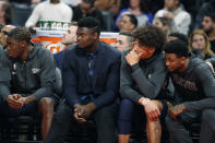 New Orleans Pelicans forward Zion Williamson, second from left, watches with teammates during the second half of an NBA basketball game against the Detroit Pistons, Monday, Jan. 13, 2020, in Detroit. (AP Photo/Carlos Osorio)