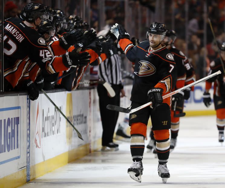 Anaheim Ducks left wing Andrew Cogliano high-fives his teammates after scoring a goal during the third period of an NHL hockey game against the New York Rangers, Sunday, March 26, 2017, in Anaheim, Calif. The Ducks won 6-3. (AP Photo/Ryan Kang)