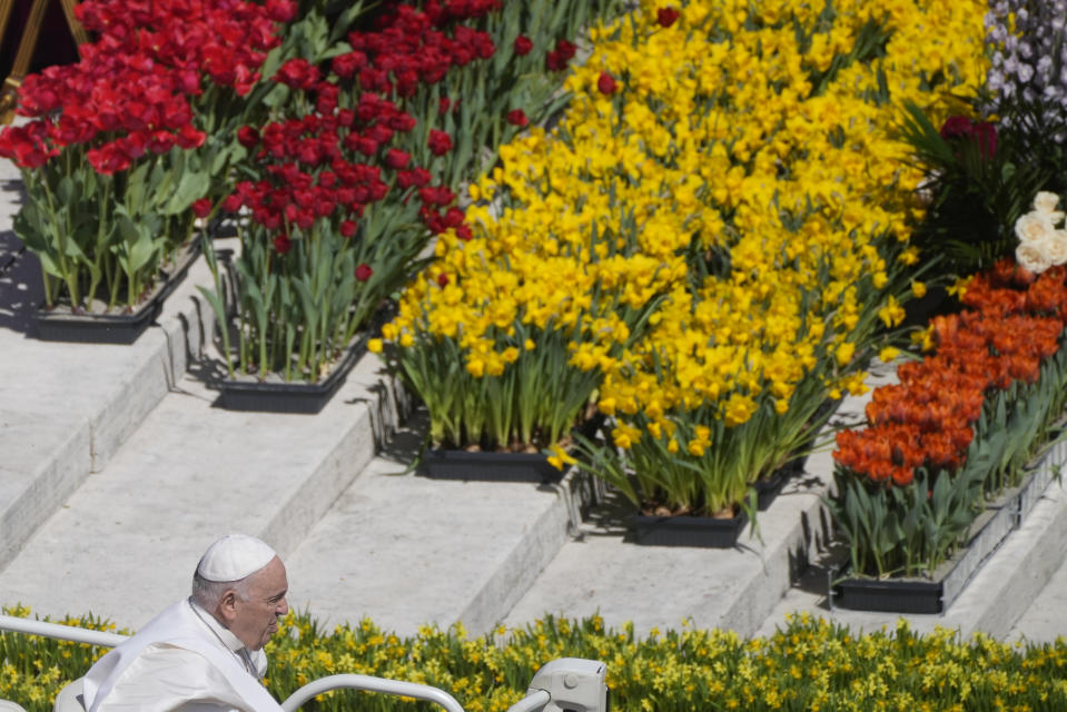 Pope Francis boards his popemobile in St. Peter's Square at The Vatican at the end of the Easter Sunday mass, Sunday, April 9, 2023. (AP Photo/Gregorio Borgia)