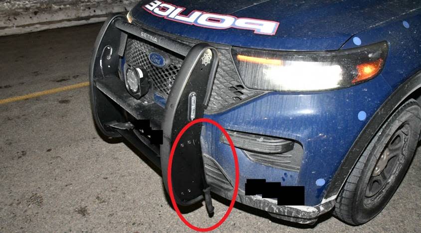 The SIU included this picture in its report, to show Nembhard's machete lodged into the front bumper of the WRPS cruiser that was driver by the officer who eventually shot and killed the man.