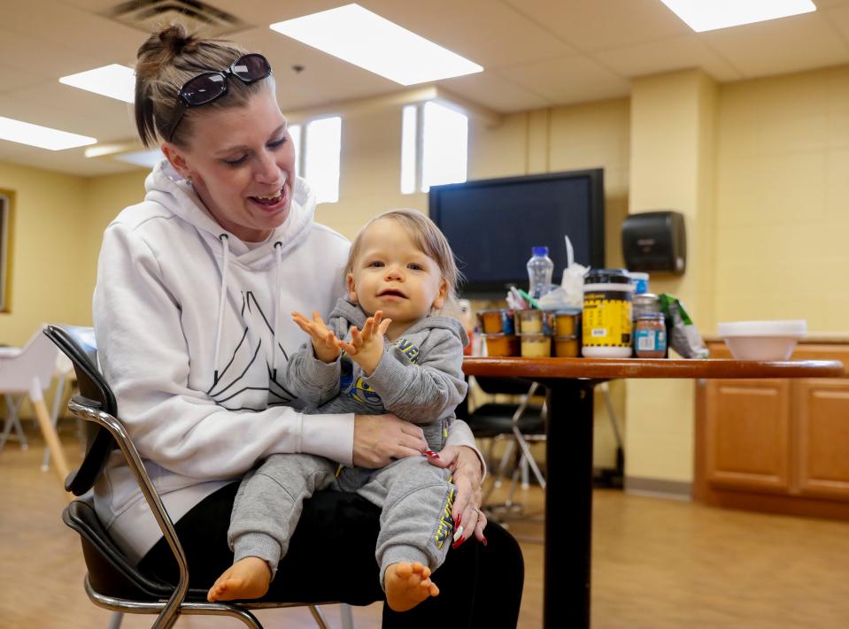 Crystal Norris and her son Ivan Norris, 1, have been at the center for seven months while waiting for permanent housing Thursday, Dec. 2, 2021 at the Dayspring Center in Indianapolis. The center provides housing as well as resources to homeless families.