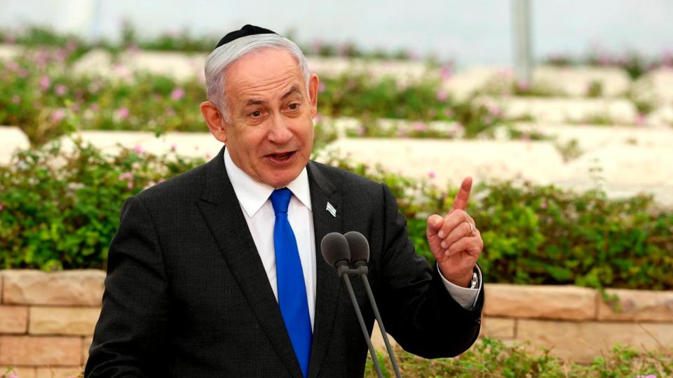 PHOTO: Israeli Prime Minister Benjamin Netanyahu speaks during a ceremony at the Nahalat Yitshak Cemetery in Tel Aviv, Israel, on June 18, 2024.  (Shaul Golan/AP)
