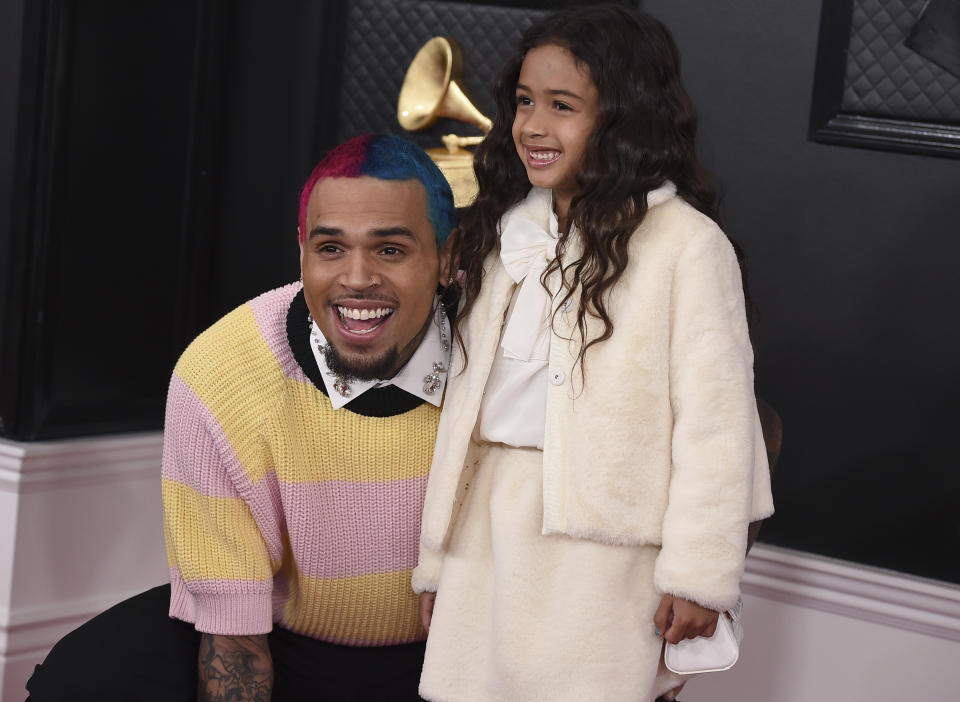 Chris Brown, left, and Royalty Brown arrive at the 62nd annual Grammy Awards at the Staples Center on Sunday, Jan. 26, 2020, in Los Angeles. (Photo by Jordan Strauss/Invision/AP)