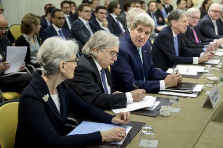 (From L to R) U.S. Under Secretary for Political Affairs Wendy Sherman, U.S. Secretary of Energy Ernest Moniz, U.S. Secretary of State John Kerry, British Foreign Secretary Philip Hammond, Russian Deputy Foreign Minister Sergei Ryabkov and German Foreign Minister Frank Walter Steinmeier wait for a meeting with officials from P5+1, the European Union and Iran at the Beau Rivage Palace Hotel in Lausanne March 31, 2015. REUTERS/Brendan Smialowski/Pool