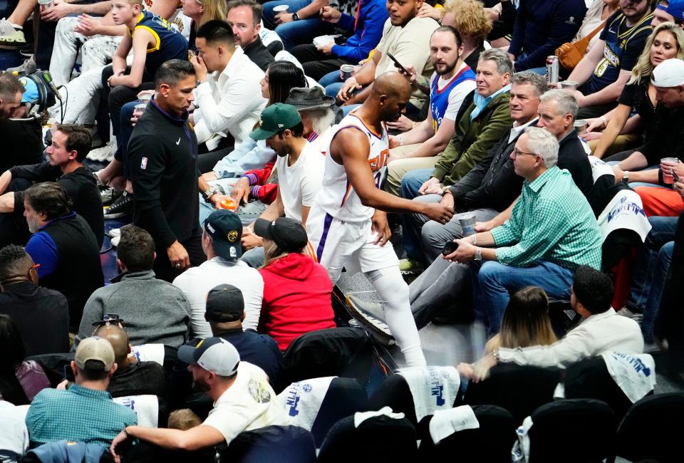 Phoenix Suns guard Chris Paul (3) leaves the game with a groin injury against the Denver Nuggets in the third quarter during Game 2 of the Western Conference Semifinals at Ball Arena in Denver on May 1, 2023.