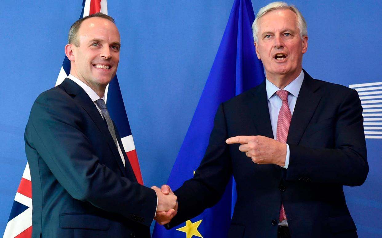 Britain's Secretary of State for Exiting the European Union (Brexit Minister) Dominic Raab (L) and EU Chief Brexit Negotiator Michel Barnier (R) - AFP