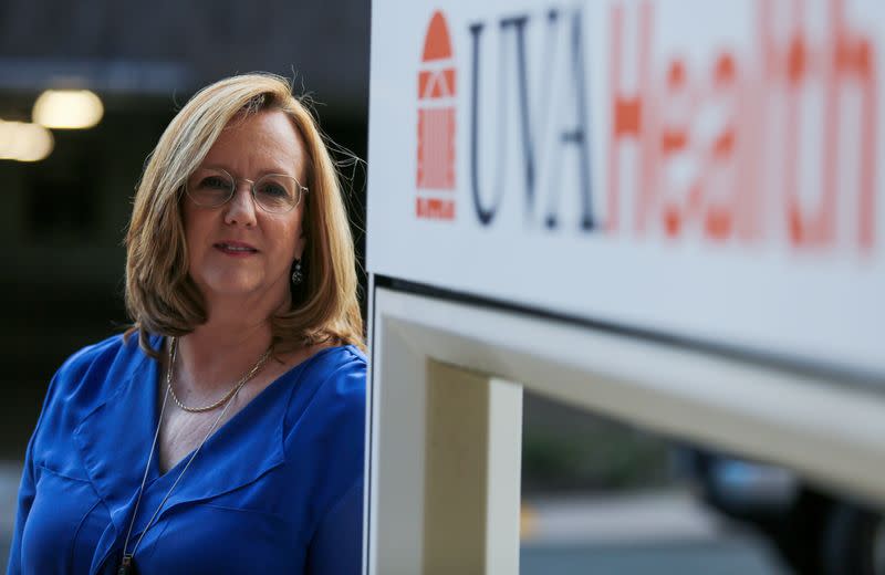 Dr. Mendy Poulter stands outside the University of Virginia Medical Center in Charlottesville, Virginia