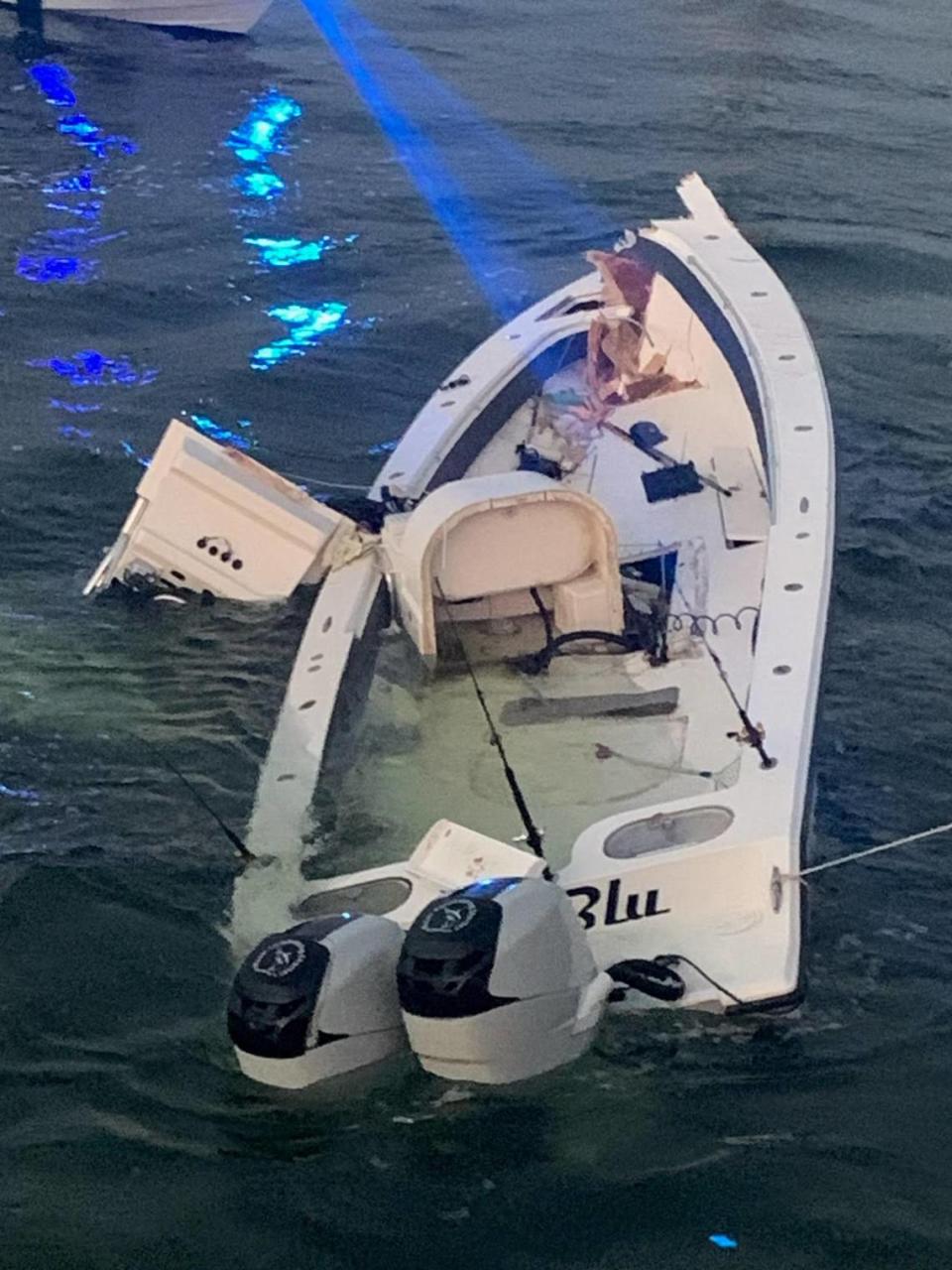 A badly damaged Sea Hunter center console floats next to the South Pine Channel Bridge in the Lower Florida Keys Monday, July 8, 2024.