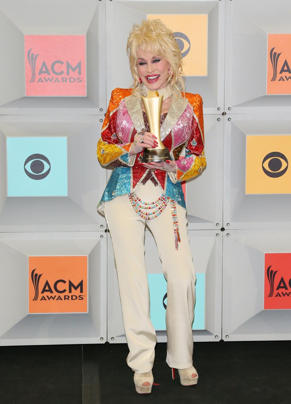 LAS VEGAS, NEVADA - APRIL 03: Dolly Parton poses in the press room during the 51st Academy of Country Music Awards at MGM Grand Garden Arena on April 3, 2016 in Las Vegas, Nevada. (Photo by JB Lacroix/WireImage)
