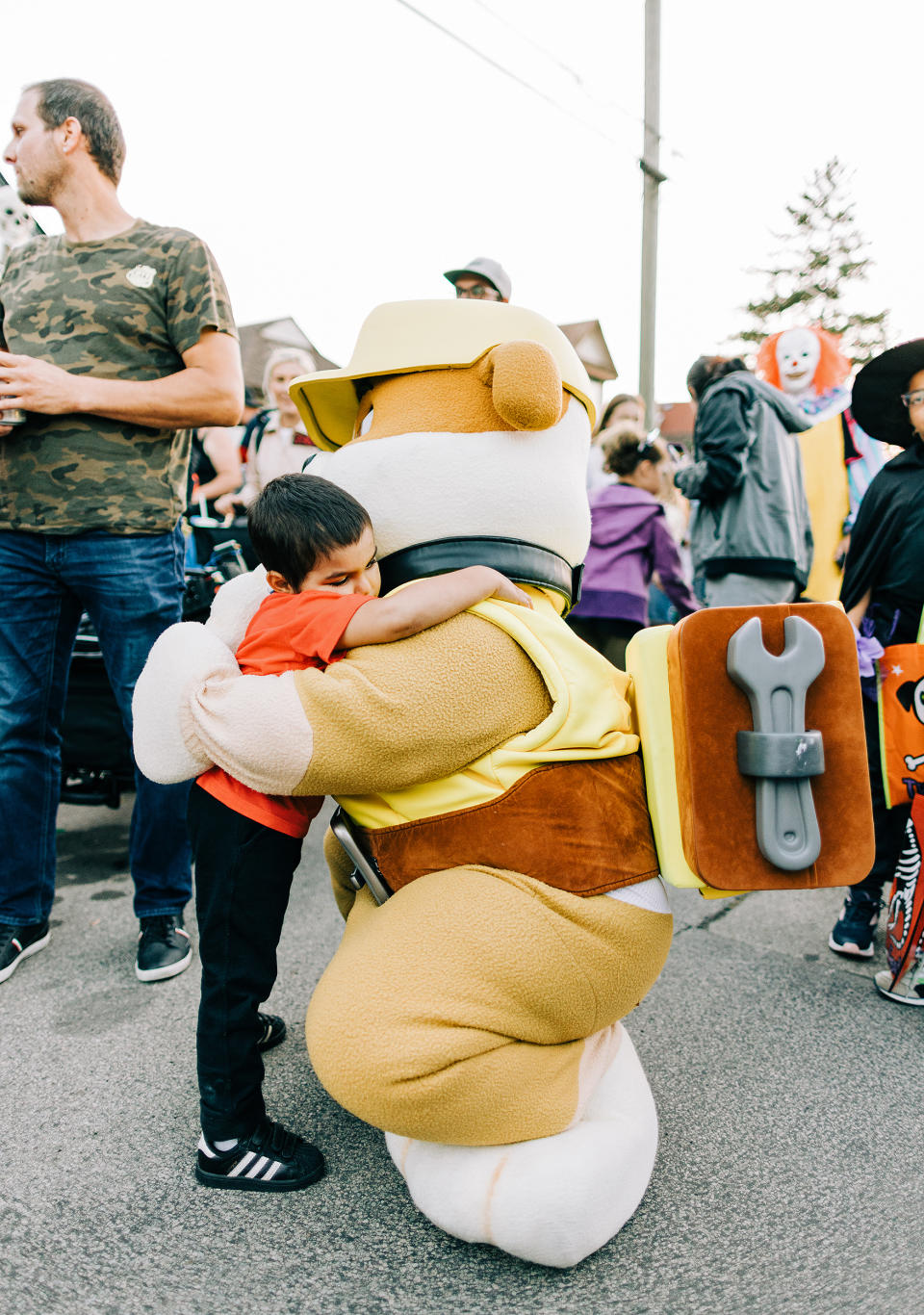 Alexandros Hurdakis gets one of many hugs at the special Halloween bash thrown in his honor. (Courtesy of Nick Parry)