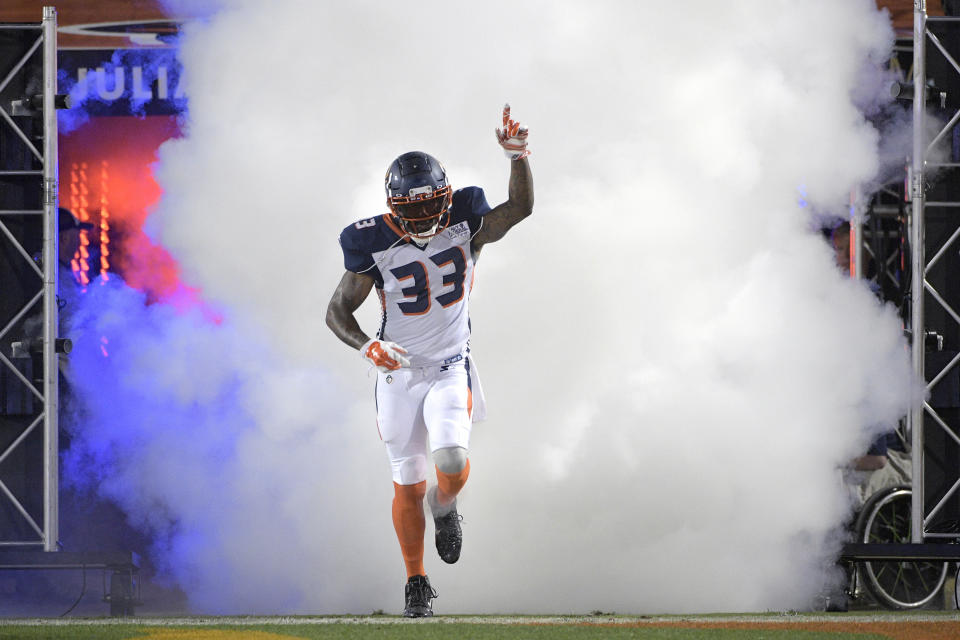 Orlando Apollos safety Will Hill III runs onto the field during player introductions before the AAF’s debut on Saturday. (AP)