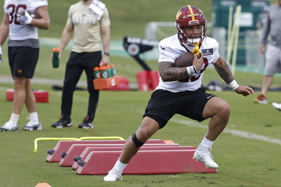 Washington Commanders running back Chris Rodriguez Jr. (23) participates in drills during Commanders rookie minicamp at Commanders Park. Mandatory Credit: Geoff Burke-USA TODAY Sports