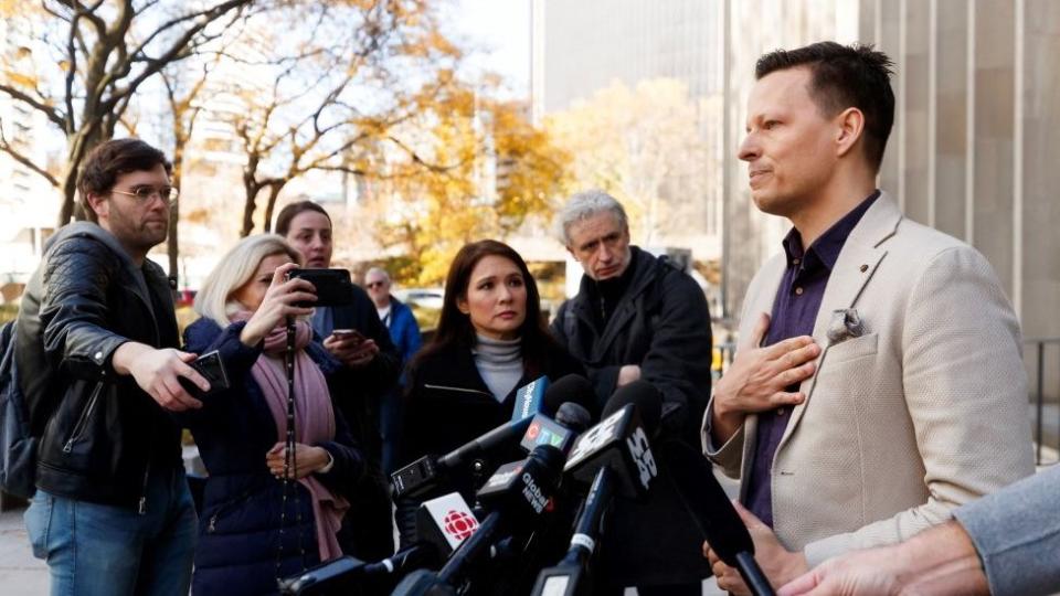 Kai Bickle-Nygard talks to reporters outside court in Toronto