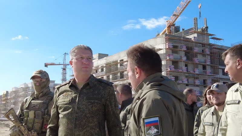 FILE PHOTO: Russian Deputy Defence Minister Timur Ivanov inspects the construction of apartment blocks in Mariupol