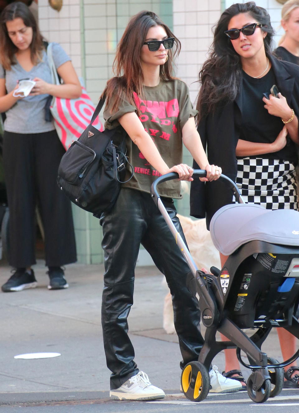 Emily Ratajkowski walks with her son, Sylvester, in New York City. - Credit: Dylan Travis/AbacaPress / SplashNews.com