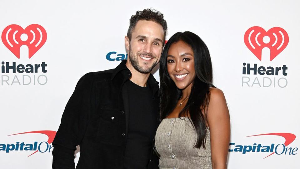 Zac Clark and Tayshia Adams attend the 2021 iHeartRadio Music Festival on September 17, 2021 at T-Mobile Arena in Las Vegas, Nevada