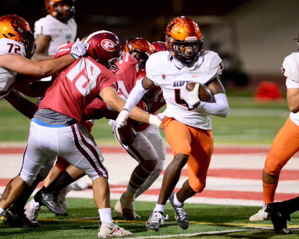 Merced running back Chase Smith (4) breaks free during a run during a game between Patterson and Merced at Patterson High School in Patterson California on September 29, 2023.