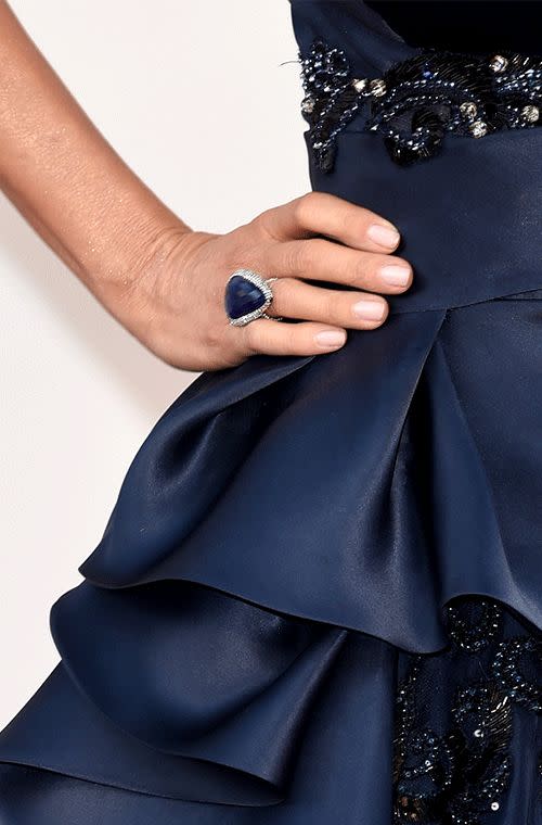 The Latin beauty flaunted a giant blue sapphire ring surrounded by lots of sparkly diamonds by Lorraine Schwartz.