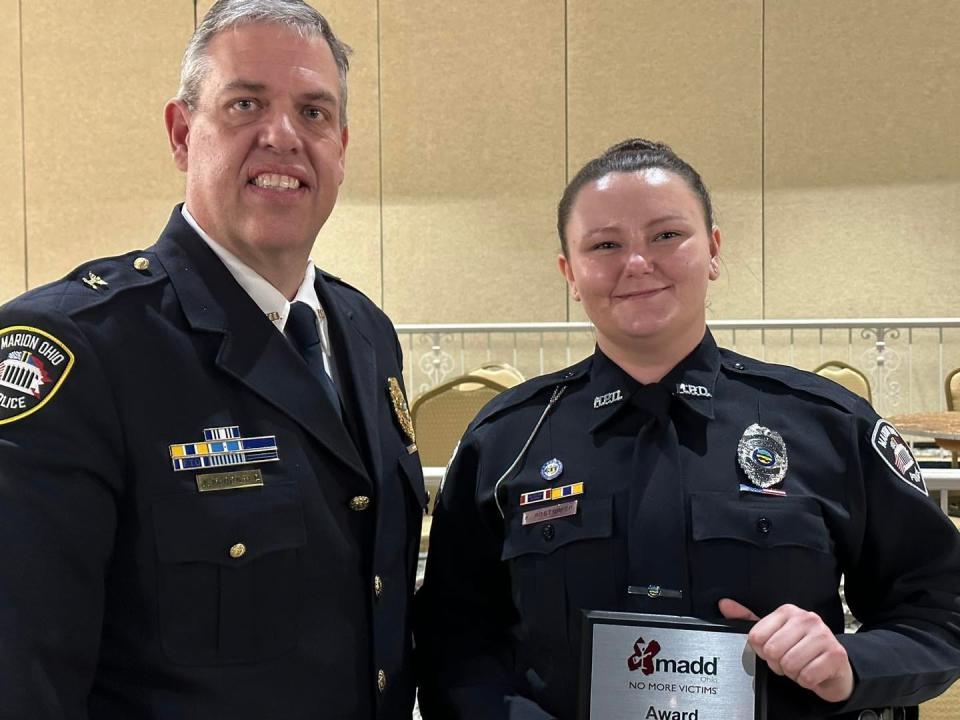 Chief Jay McDonald was with officer Katrina Rostorfer after she received an excellence award from the Central Ohio Mothers Against Drunk Driving in 2022 for her work keeping impaired drivers of the streets.