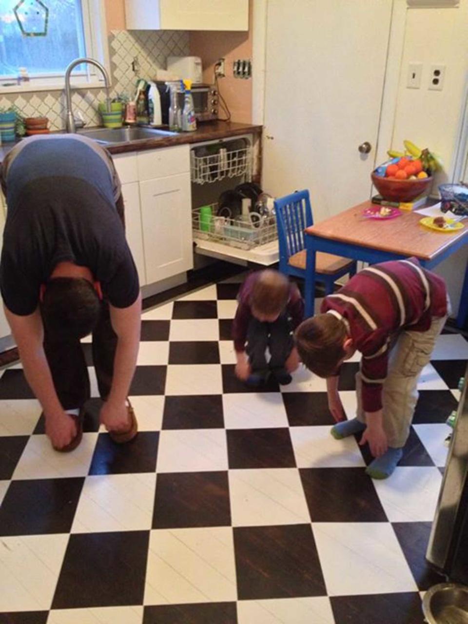 "After dinner, pre-clean up, kitchen-yoga. Aka: stalling"