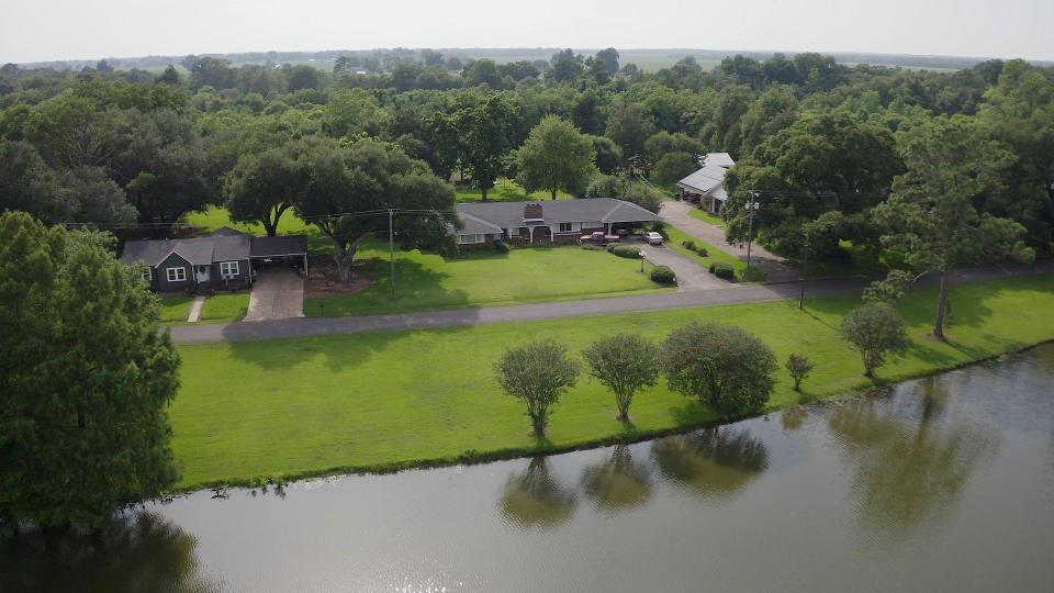 Megan and Dustin Parra's home, center, in Cottonport, Louisiana.  / Credit: CBS News