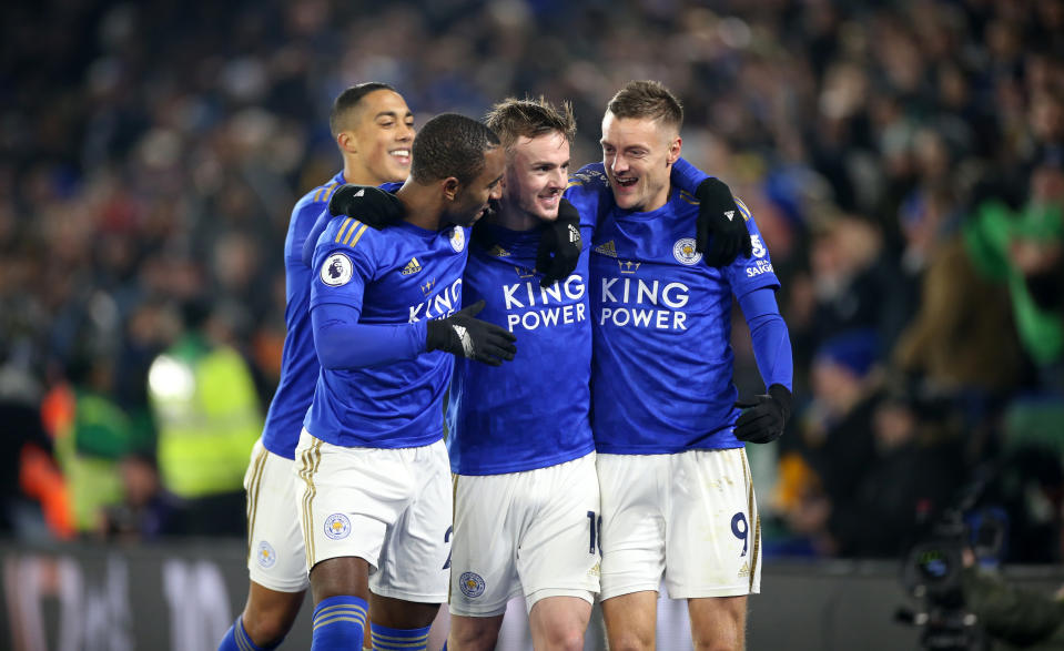 LEICESTER, ENGLAND - DECEMBER 04: Jamie Vardy of Leicester City celebrates with Ricardo Pereira of Leicester City, James Maddison of Leicester City and Youri Tielemans of Leicester City after scoring from the penalty spot to make it 1-0 during the Premier League match between Leicester City and Watford at The King Power Stadium on December 4, 2019 in Leicester, United Kingdom. (Photo by Plumb Images/Leicester City FC via Getty Images)