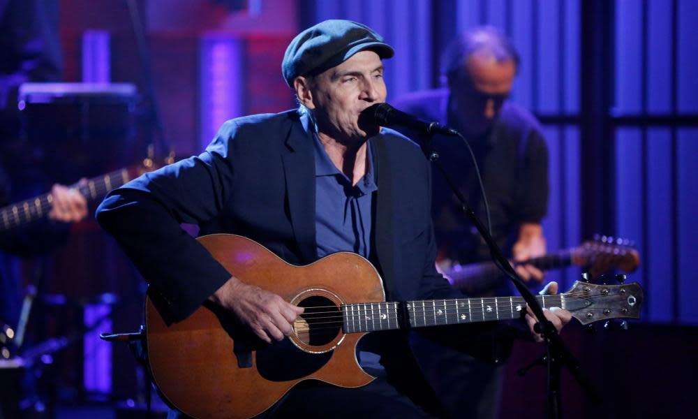 James Taylor performing on late-night TV in 2015.