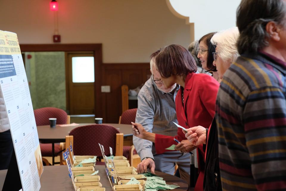 Amarillo Councilwoman Freda Powell looks over a display at the Texas Historical Commission preservation forum at the Sante Fe building in Amarillo Thursday