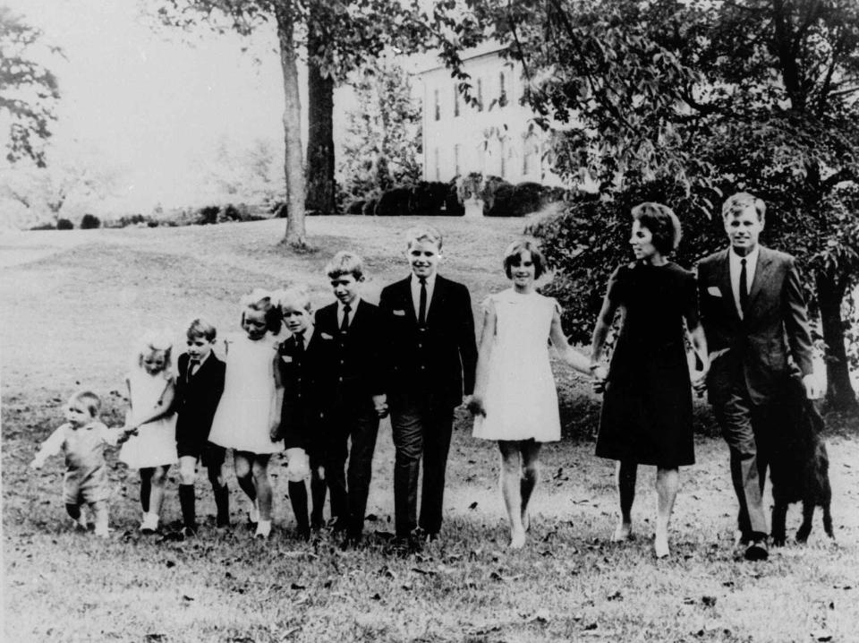 Senator Robert F. Kennedy and Ethel Kennedy pose with eight of their nine children on the lawn of their home at McLean, Va., in this October 15, 1966, file photo. From left: Kathleen, 15; Joseph, 14;  Robert Jr, 13;  David, 11; Mary Courtney, 10; Michael, 8;  Kerry, 7; and Christopher, 3. Matthew 21-months is not shown.
