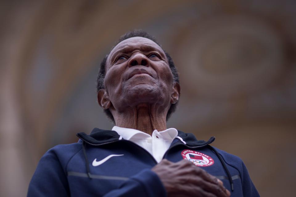 Rafer Johnson before pushing the ignition switch to light the Los Angeles Memorial Coliseum's Olympic cauldron on September 17, 2017. (Credit: David McNew/AFP via Getty Images)