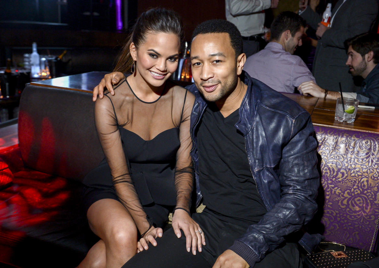 Image: Chrissy Teigen, wearing an engagement ring and John Legend on February 13, 2013 in Las Vegas, Nev. (Michael Loccisano / Getty Images)