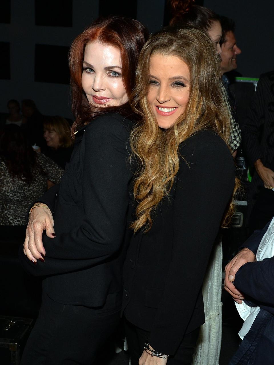 Lisa Marie Presley with mother Priscilla in 2013 (Getty)