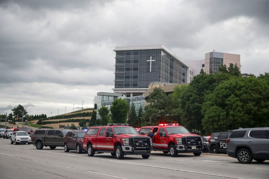 Tulsa police and firefighters respond to a shooting at the Natalie Medical Building Wednesday, June 1, 2022. in Tulsa, Okla. Multiple people were shot at a Tulsa medical building on a hospital campus Wednesday. (Ian Maule/Tulsa World via AP)