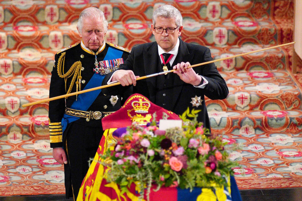 King Charles III (L) watches as the Lord Chamberlain breaks his Wand of Office at the Committal Service for Queen Elizabeth II held at St George's Chapel in Windsor Castle on September 19, 2022. (Photo by Ben Birchall / POOL / AFP) (Photo by BEN BIRCHALL/POOL/AFP via Getty Images)