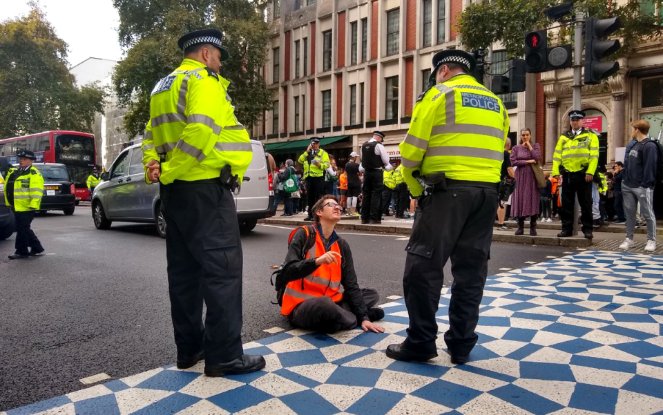 Police have taken to task unglueing protesters’ hands from the road (Just Stop Oil)