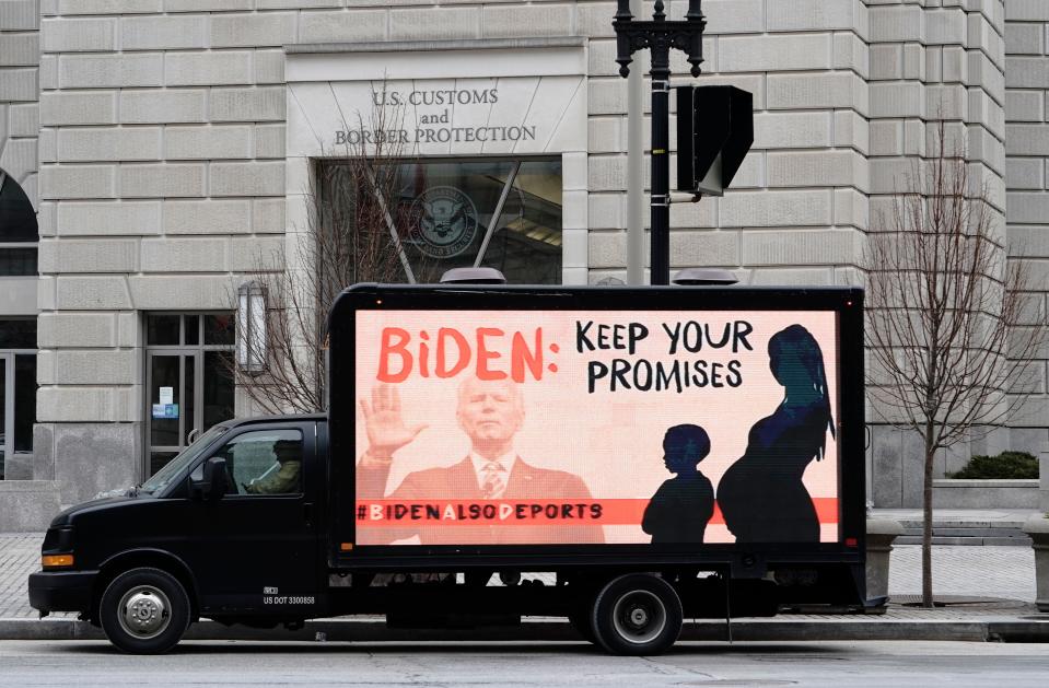 An L.E.D. truck displaying messages expressing concern over the continuing mass deportations of Black immigrants drives past the office of U.S. Customs and Border Protection prior to a #BidenAlsoDeports rally on February 15, 2021, in Washington, D.C.