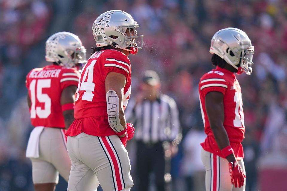 Nov 26, 2022; Columbus, Ohio, USA;  Ohio State Buckeyes defensive end J.T. Tuimoloau (44) yells after making a tackle during the first half of the NCAA football game against the Michigan Wolverines at Ohio Stadium. Mandatory Credit: Adam Cairns-The Columbus Dispatch