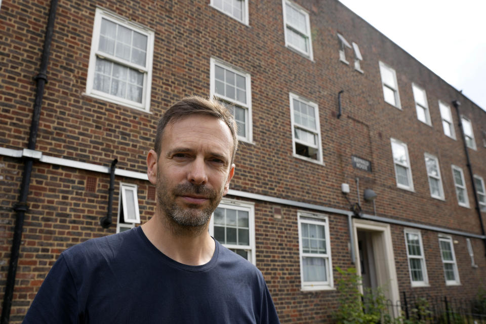 John Taylor, a case worker for the debt relief charity, Christians Against Poverty, speaks to the media in London, Thursday, Aug. 25, 2022. Taylor, said growing numbers of people who have never had debt problems are turning to the group's helpline. (AP Photo/Frank Augstein)