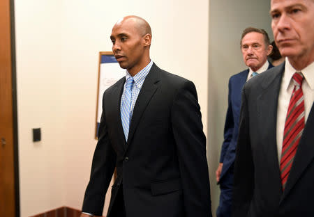 Mohamed Noor, former Minnesota policeman on trial for fatally shooting an Australian woman, walks into the courthouse in Minneapolis, Minnesota, U.S., April 30, 2019. REUTERS/Craig Lassig