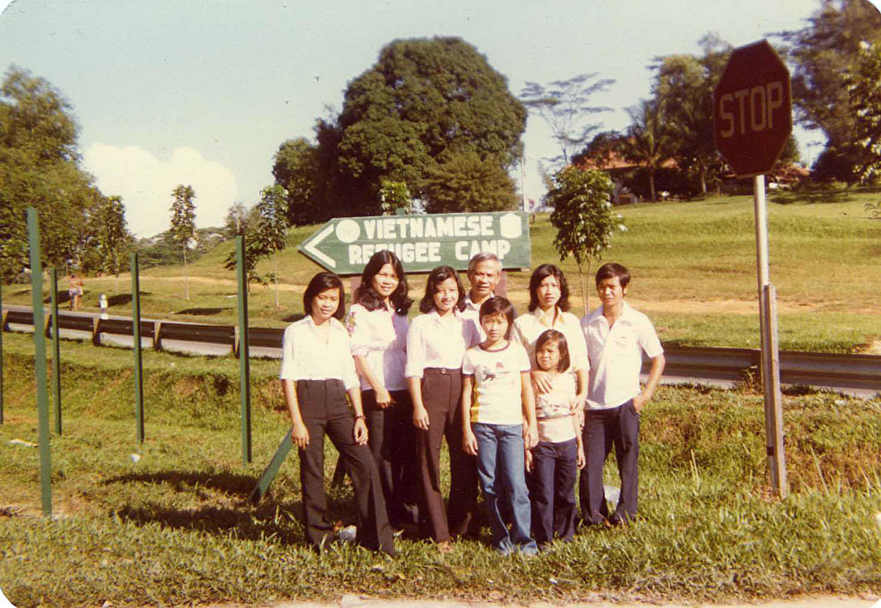 11-year-old Heather Stenseng (third from right) with her extended family and friends at the former refugee camp at Hawkins Road in Sembawang, Singapore in 1981. Everyone in the photo was eventually resettled in the United States. PHOTO: Heather Stenseng 