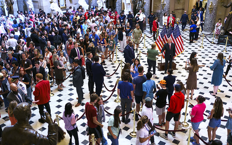 Speaker Kevin McCarthy (R-Calif.) greets tourists and takes pictures in Statuary Hall