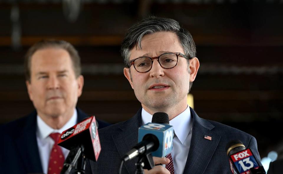 House Speaker Mike Johnson, R-La., with U.S. Congressman Vern Buchanan, R-Longboat Key, addresses the press before he touring the construction site for the $70 million ground-level passenger terminal at Sarasota Bradenton International Airport.