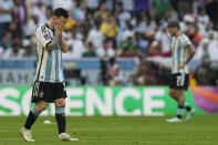 Argentina's Lionel Messi reacts during the World Cup group C soccer match between Argentina and Saudi Arabia at the Lusail Stadium in Lusail, Qatar, Tuesday, Nov. 22, 2022. (AP Photo/Ebrahim Noroozi)