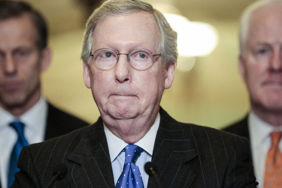 It's not often we see Sen. Mitch McConnell (R-Ky.) crack a smile. He dons his go-to straight face most of the time. Ahead, see the rare grins of the Kentucky senator.   (Photo by T.J. Kirkpatrick/Getty Images)