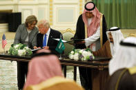 <p>Saudi Arabia’s King Salman bin Abdulaziz Al Saud (R) and U.S. President Donald Trump (L) sign a joint security agreement at the Royal Court in Riyadh, Saudi Arabia on May 20, 2017. (Photo: Jonathan Ernst/Reuters) </p>