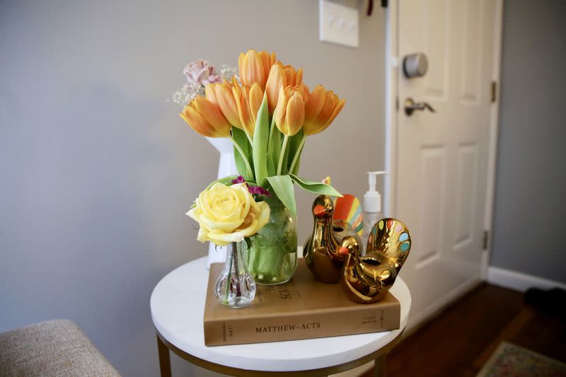 Flowers and gifts given to the wife of a coronavirus patient by residents, are pictured in Wilton