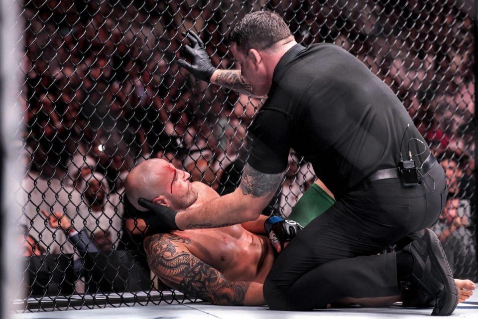 Volkanovski was left bloodied by the fight-ending sequence (AFP via Getty Images)