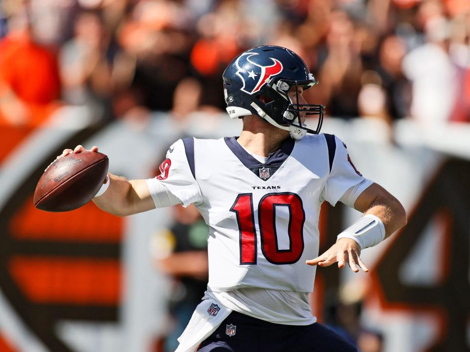 Davis Mills makes a throw against the Cleveland Browns.