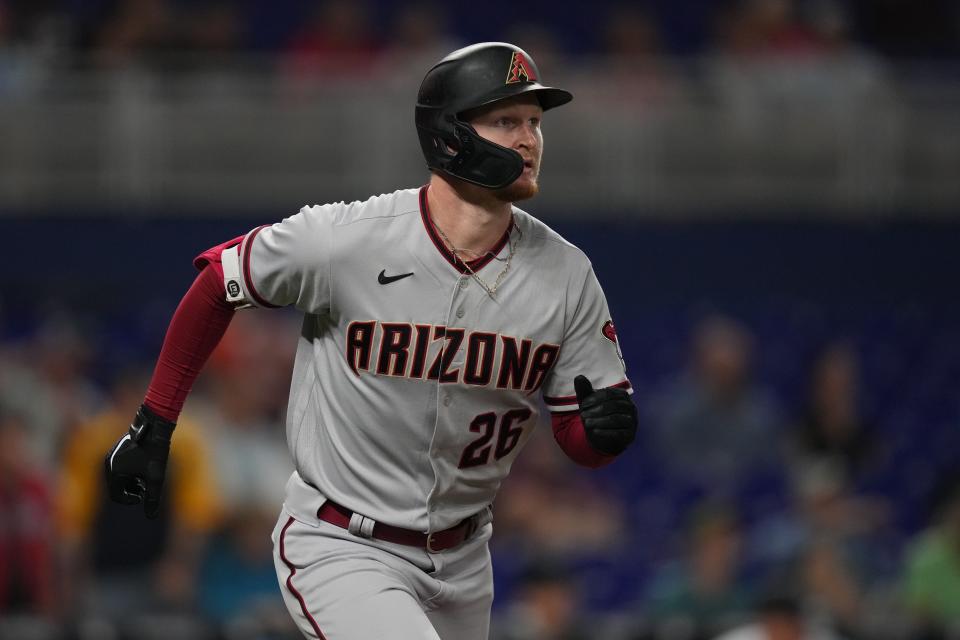 Pavin Smith rounds the bases after hitting a solo home run against the Marlins Tuesday night during the Diamondbacks' win in Miami.